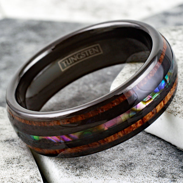 Brilliant Polished Black Tungsten Low Dome Ring with Iridescent Abalone Inlay Between Two Black Bands And Koa Wood Inlays.