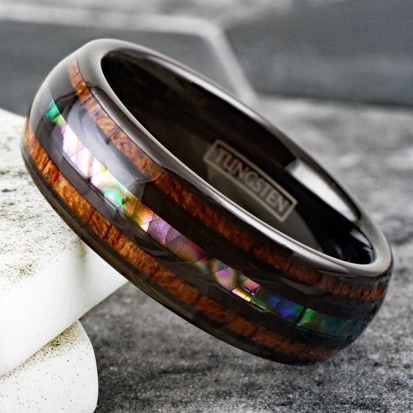 Brilliant Polished Black Tungsten Low Dome Ring with Iridescent Abalone Inlay Between Two Black Bands And Koa Wood Inlays.
