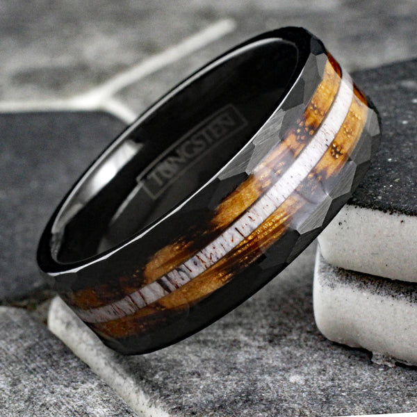 Sublime Faceted Brushed Finish Black Tungsten Flat Band Ring with Deer Antler Inlay Between Whiskey Barrel Oak Wood Inlays.