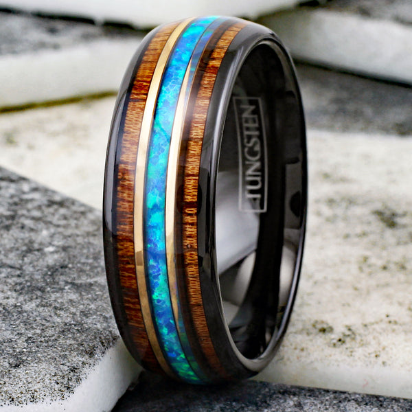 Gorgeous Polished Black Tungsten Low Dome Ring with Iridescent Man-Made Crushed Hawaii Blue Opal Inlay Between Two Rose  Surrounded By Koa Wood Inlays.