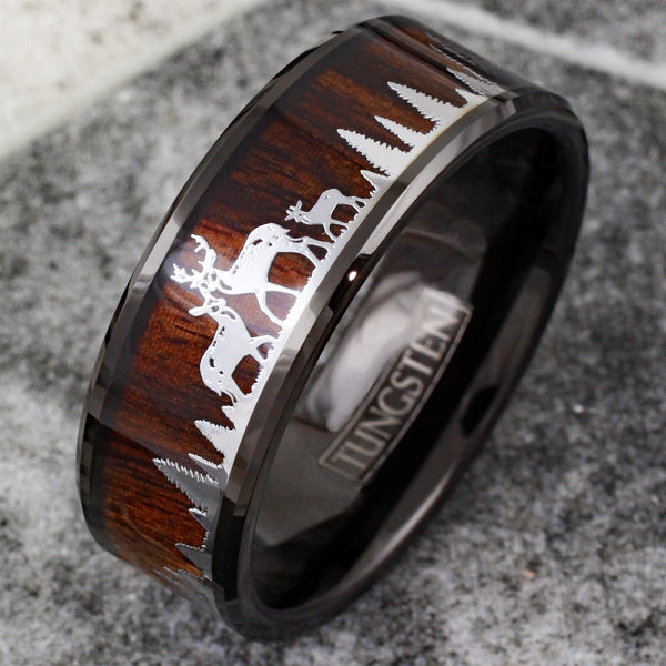 Beautiful Polished Finish Black Flat Band Tungsten Ring With Silver Deer Family In Forest Scene Overlay On Wood Inlay.