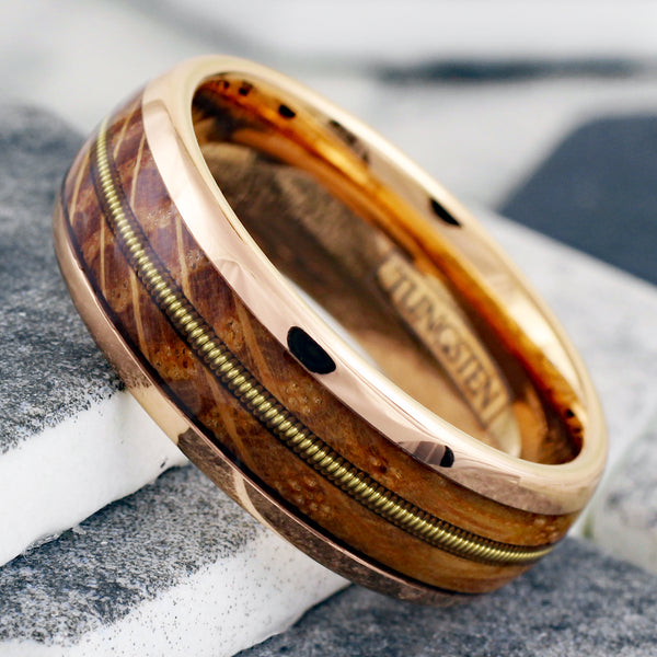 Glorious Polished Rose Gold Tungsten Low Dome Ring with Cool Genuine Guitar String Between Whiskey Barrel Oak Wood Inlays.