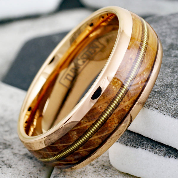 Glorious Polished Rose Gold Tungsten Low Dome Ring with Cool Genuine Guitar String Between Whiskey Barrel Oak Wood Inlays.