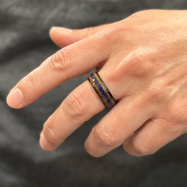 Unique Polished Black Low Dome Tungsten Ring with Blue Lapis Lazuli Between Whiskey Barrel Oak Wood Inlays.