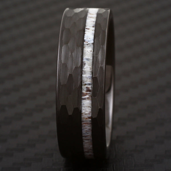 Hexagon brushed finish black tungsten carbide ring w/ asymmetrical deer antler inlay | Black front photo