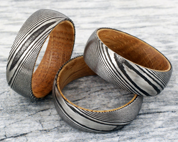 Silver Black Damascus steel ring - Whiskey Barrel Oak Wood | Discount Damascus Steel wedding bands & Rings | Group photo
