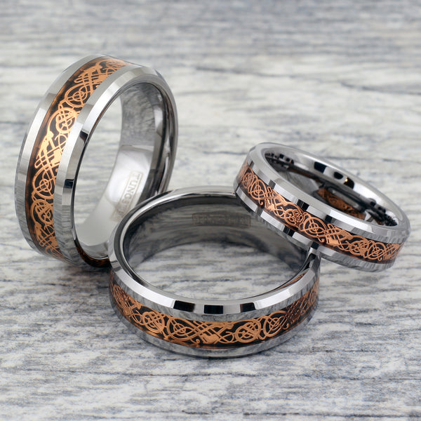 Silver tungsten carbide ring | Rose gold Celtic dragon on Black faux carbon fiber inlay | Group Photo.