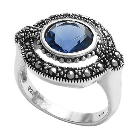 Elegant oval marcasite ring with deep blue CZ stone. Wholesale Sterling Silver Rings. Main Photo.