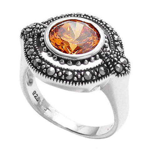 Elegant oval marcasite ring with 1.75 carat orange CZ. Wholesale Sterling Silver Rings. Main photo.
