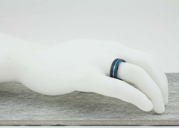 Black tungsten ring | Sky Blue anodized aluminum inner band & stripe | Beveled edges | Wholesale tungsten carbide rings - wedding bands | hand photo