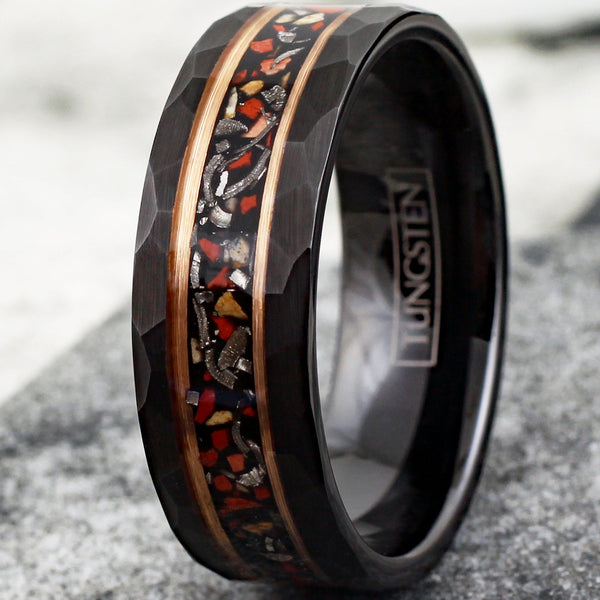 Spectacular Faceted Brushed Finish Black Tungsten Flat Band Ring with Crushed Faux Dinosaur Bone and Black Faux Meteorite Inlay between Rose Gold Stripes.