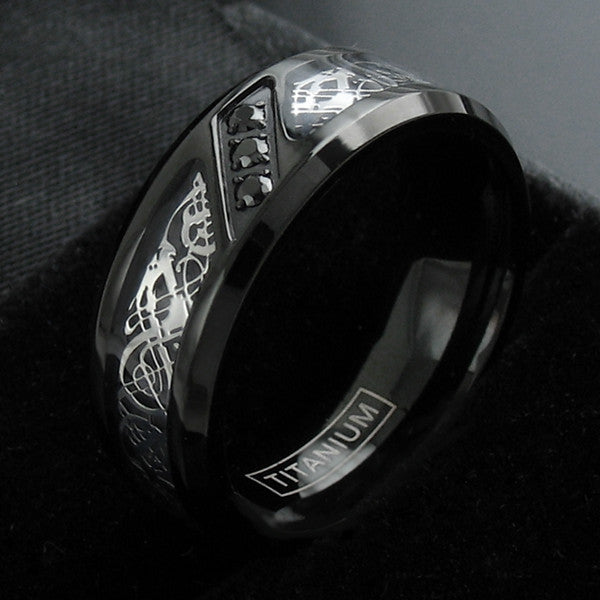Black titanium ring with silver Celtic dragon and three CZ accents | Wholesale Jewelry | Black photo