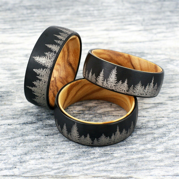 Black tungsten carbide low dome band ring 2/ etched forestry scene & olive wood inner band | group photo