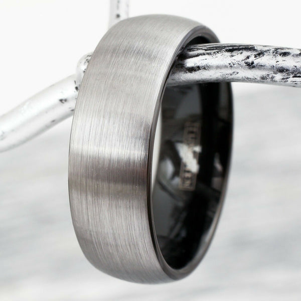 Two-tone tungsten carbide ring w/ silver brushed satin finish outer band & black inner band | Branch photo