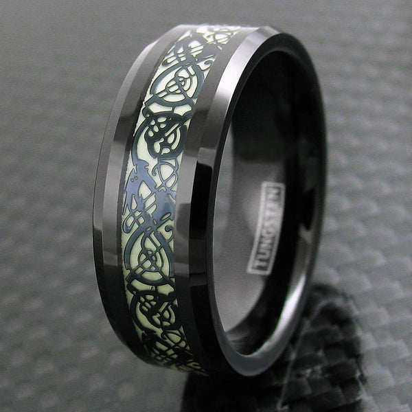 Stunning Black Tungsten Ring with Black Celtic Dragon on Glow in the Dark Background.