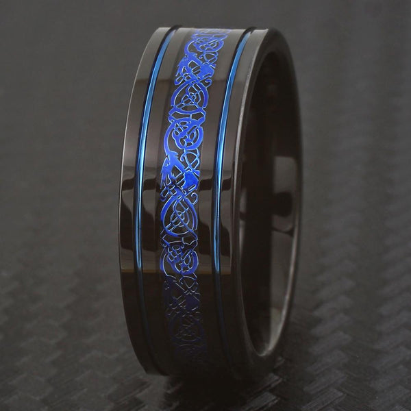 Black tungsten ring w. blue Celtic dragon between two blue stripes | Wholesale Tungsten Rings - Wedding Bands | Black background photo