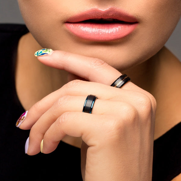 Black tungsten ring w/ recessed rose gold stripe & beveled edges | Discount Tungsten Rings - Wedding Bands | Model photo