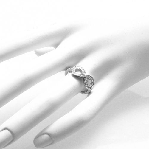 Radiant CZ encrusted infinity ring | Wholesale Sterling Silver Rings - Jewelry | Hand photo