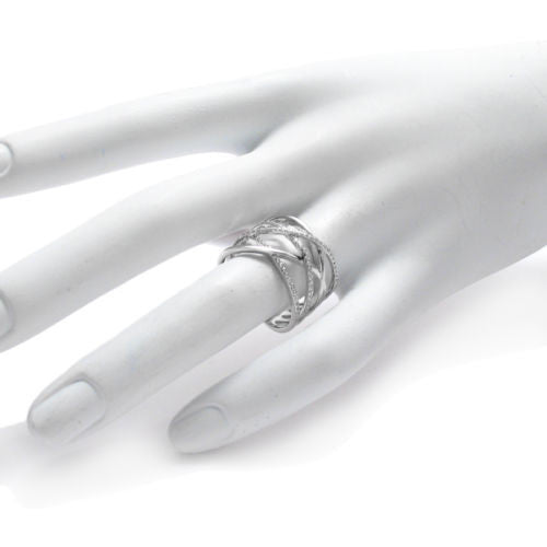 Sterling silver crisscross ring with CZ stone embellishments | Wholesale sterling silver rings | Hand photo.