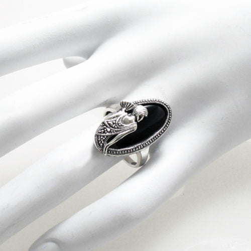 Flapper by the sea with fan in black onyx & silver. Wholesale sterling silver rings. Hand photo