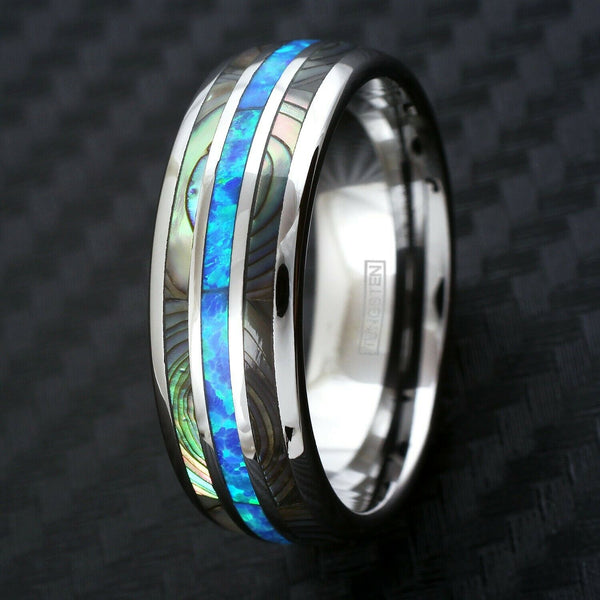 Polished silver low dome tungsten carbide band ring w/ created Hawaiian blue opal & abalone inlays | Quarter photo