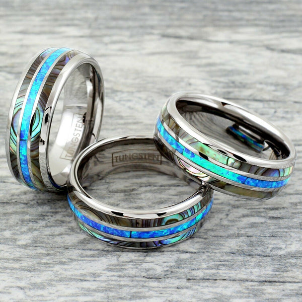 Polished silver low dome tungsten carbide band ring w/ created Hawaiian blue opal & abalone inlays | Group photo