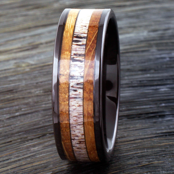 Polished black tungsten carbide band ring w/ deer antler & whiskey barrel oak wood inlays | 8mm Front wood photo
