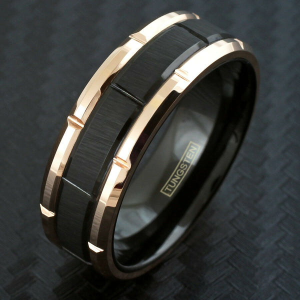 Polished Rose gold notched tungsten carbide band ring | Brushed black notched center band | Tilted photo