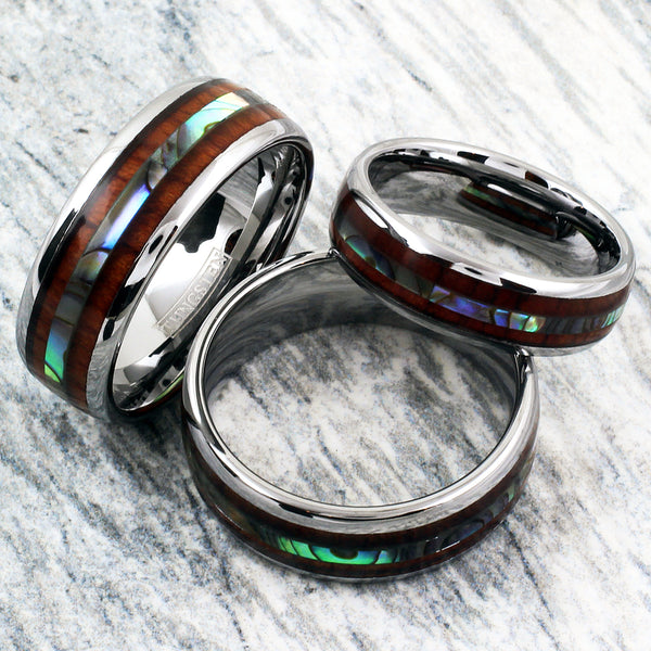 Silver tungsten dome ring w/ abalone inlay between Koa wood inlays | Group photo