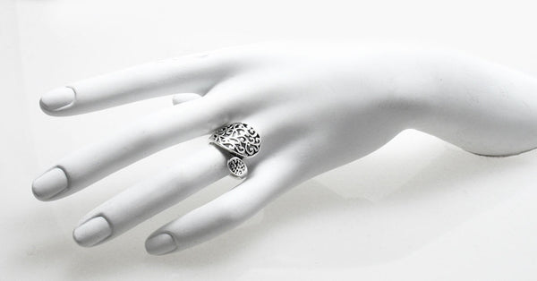 A beautiful filigreed wrap ring in the classic spoon ring shape. Wholesale Sterling Silver Rings. On hand.