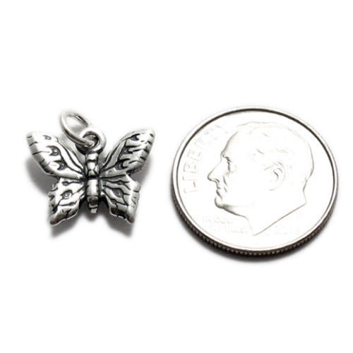 Butterfly in a Small Charm. Sterling Silver.