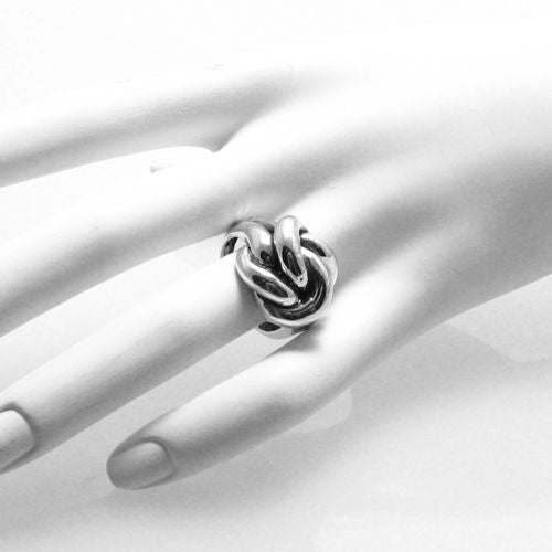 Modern interpretation of the classic love-knot ring. Extra twist. Wholesale Sterling Silver Rings. On hand.