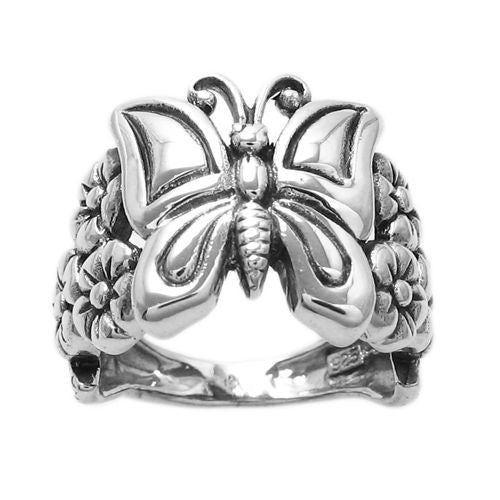 Adorable butterfly sitting on a flower bed waiting to fly away. Wholesale Sterling Silver Rings.