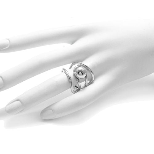 Unique and Artistic Ball Caught in Rails Ring in Sterling Silver.