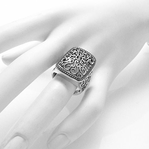 A intricately sculpted rectangular shaped domed scroll filigree ring. Wholesale Sterling Silver Rings. On hand.