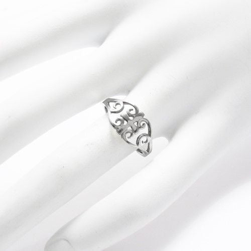 Small cross surrounded by filigree scrolls. Wholesale sterling silver rings. On hand.