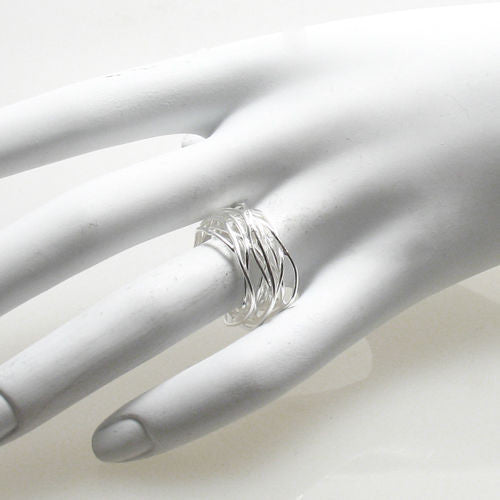Unusual ring made of thin intertwined wires. Very avant-garde. Wholesale Sterling Silver Rings. On hand.