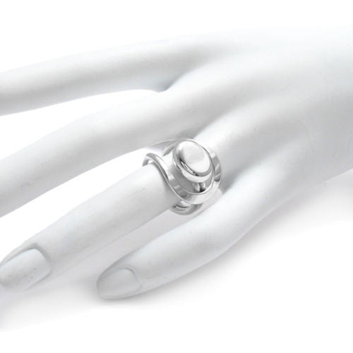 Constantly moving curves and flowing lines trapping a button. Wholesale Sterling Silver Rings. On hand.