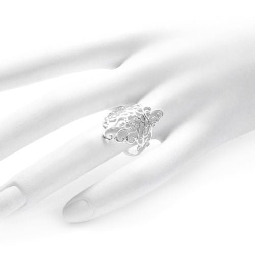 Wonderfully intricate ring adorned in scrolled filigree. Wholesale Sterling Silver Rings. On hand.