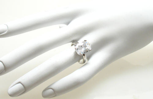 Sterling silver ring with 10x14mm rectangular CZ solitaire. Wholesale sterling silver rings. Hand photo.