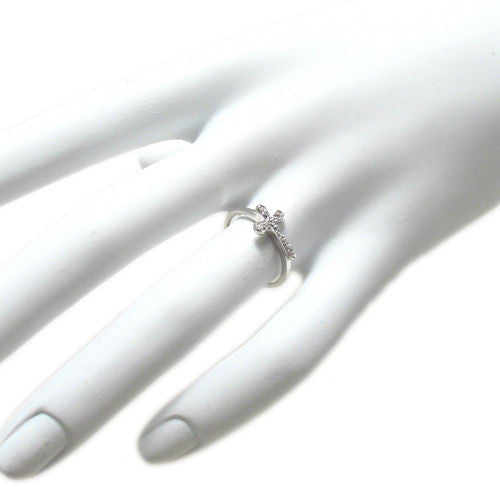 Sideways placed CZ encrusted cross on plain band | Wholesale sterling silver rings - Jewelry | Hand photo
