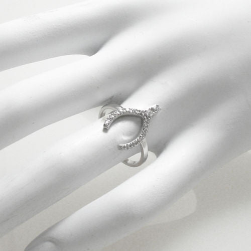 Clever CZ encrusted wishbone ring in rhodium finish | Wholesale sterling silver rings - jewelry | Hand photo